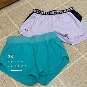 Pair of shorts. Is small stain in purple as seen in pictures